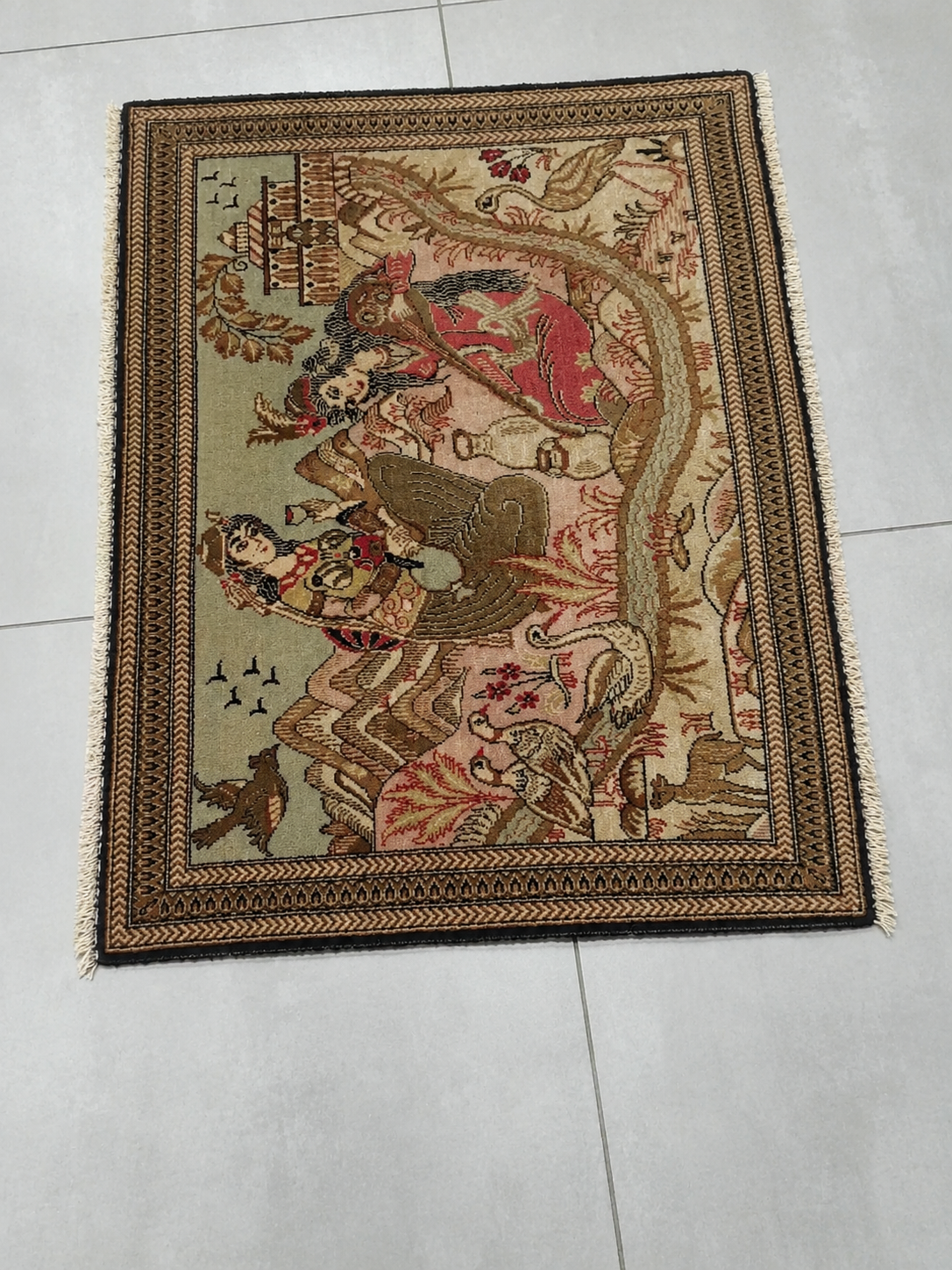 Persian carpet detail showing traditional weave and pattern